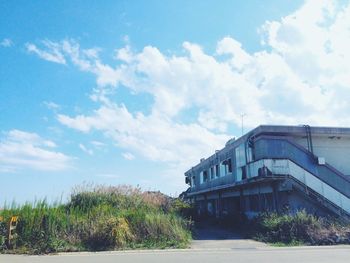 Built structure against cloudy sky