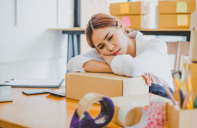 Portrait of young businesswoman working in office