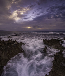 Scenic view of sea against sky during sunset