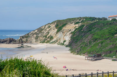 Scenic view of beach against sky