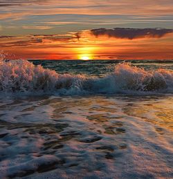 Scenic view of sea against sky during sunset