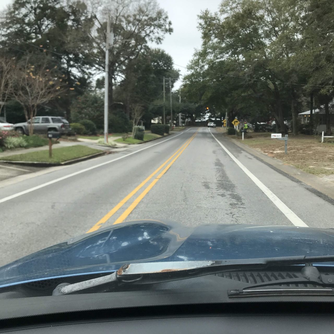 VIEW OF CAR ON ROAD