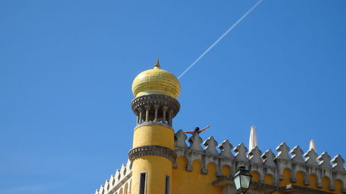 Low angle view of cathedral against clear blue sky