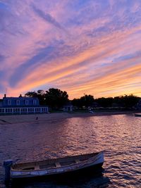 Scenic view of buildings against sky during sunset