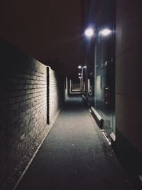 Empty illuminated corridor of building