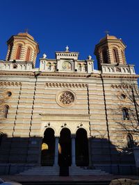 Low angle view of cathedral against clear blue sky