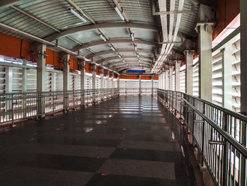 Empty corridor walk way in building