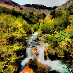 Scenic view of river flowing through rocks