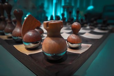 Close-up of chess pieces on table