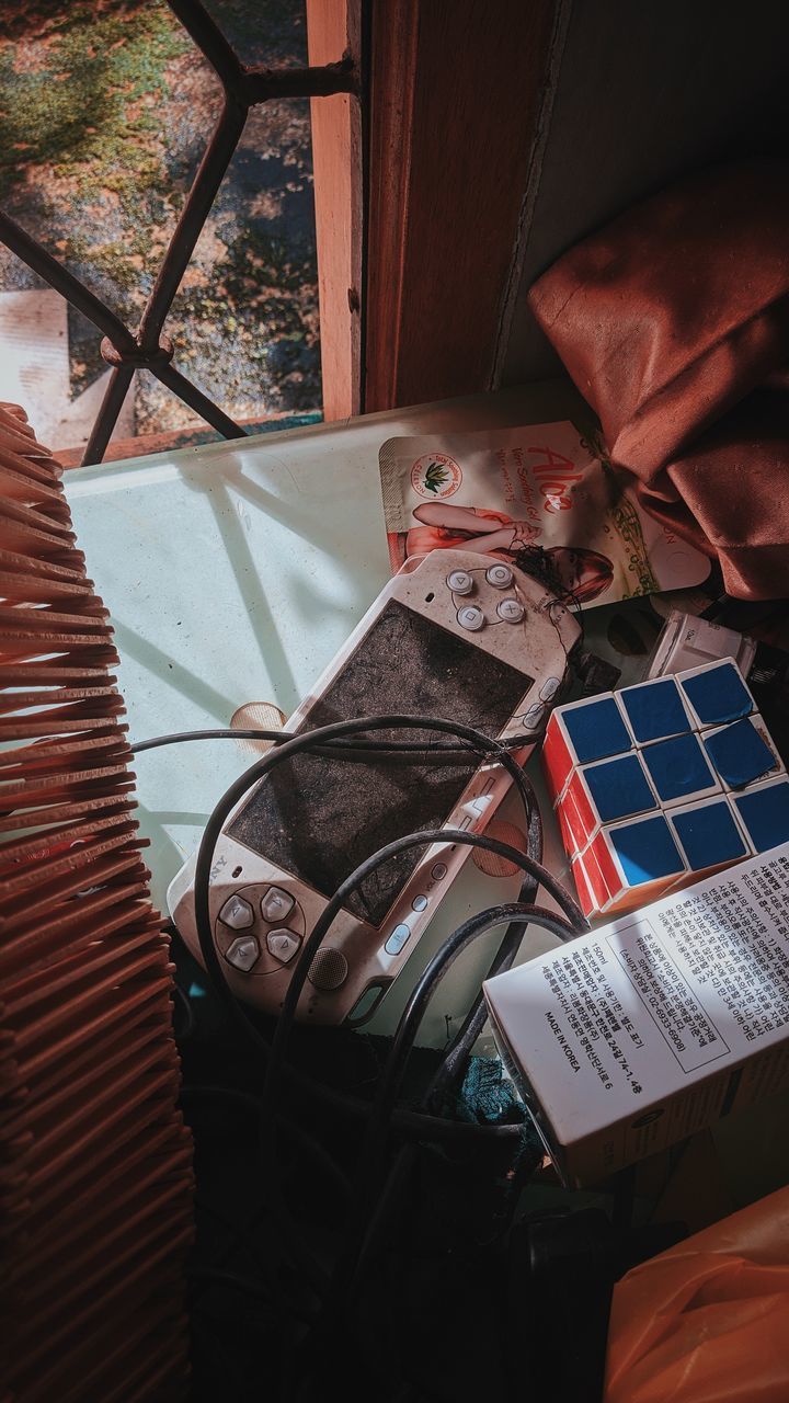 CLOSE-UP OF OPEN BOOK ON TABLE