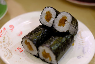 Close-up of sushi served in plate