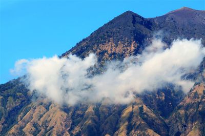 Scenic view of majestic mountains against sky