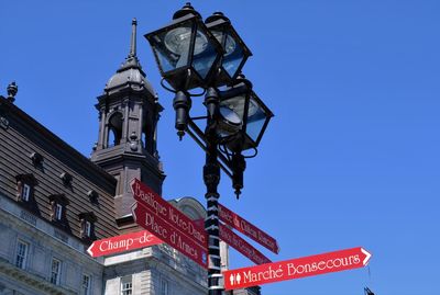 Low angle view of building against blue sky