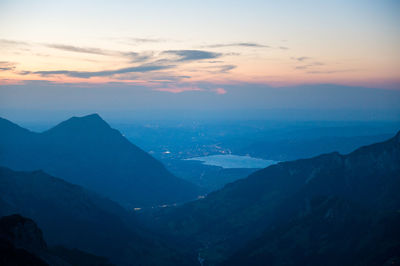 Scenic view of mountains against sky during sunset