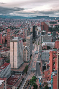 High angle view of buildings in city against sky