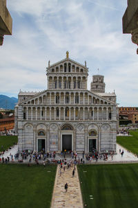 Group of people in front of historical building