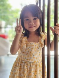 Portrait of cute girl looking at camera 