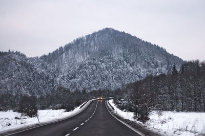 Snow covered mountain against sky