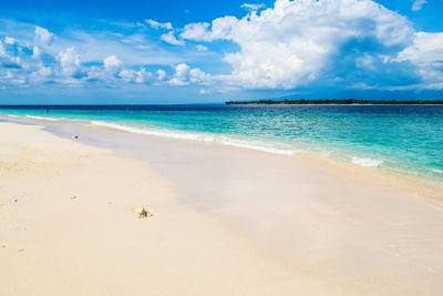 Scenic view of beach against sky