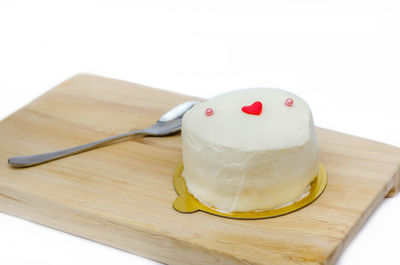 Close-up of ice cream on cutting board