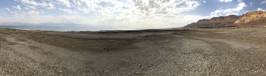 Panoramic view of desert against sky