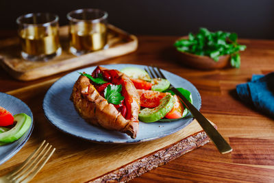 Close-up of delicious meal served on table