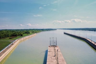 Scenic view of pier over sea against sky