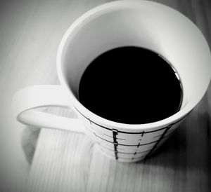 High angle view of coffee cup on table