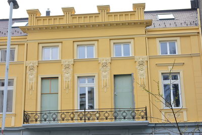 Low angle view of residential building against sky