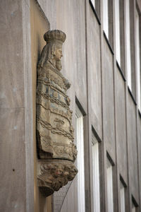 Close-up of virgin mary statue on wall