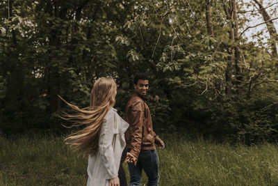 Smiling couple walking together