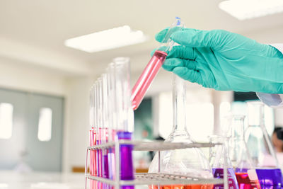 Cropped hand of scientist working in laboratory