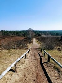 Scenic view of land against clear sky