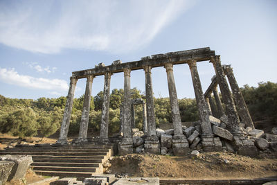 Low angle view of old ruin building against sky