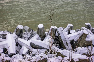 High angle view of snow on shore