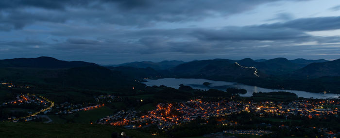 High angle view of illuminated buildings in city against sky