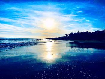 Scenic view of sea against sky at sunset