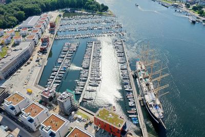 High angle view of cityscape by sea