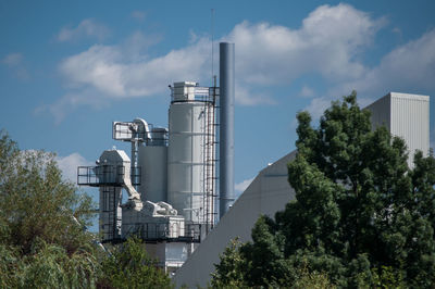 Low angle view of water tower against sky