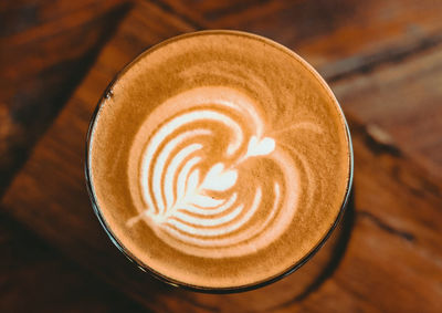 High angle view of cappuccino on table