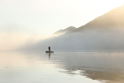 Shot of a person fishing on boat