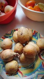 Close-up of bread in plate on table