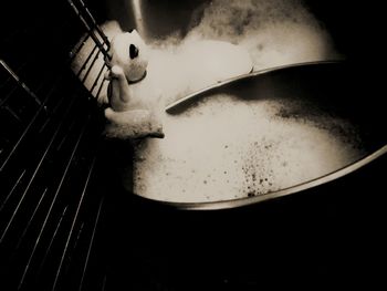 High angle view of meat on barbecue grill