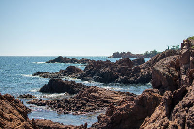 Scenic view of sea against clear sky