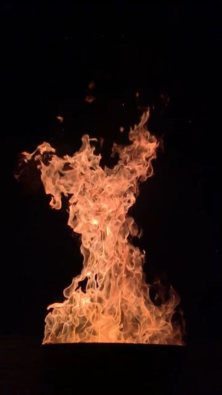 CLOSE-UP OF FIRE AT NIGHT