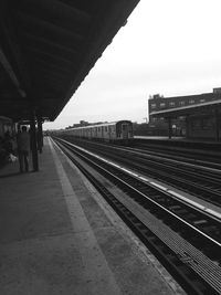 Railroad station platform against sky