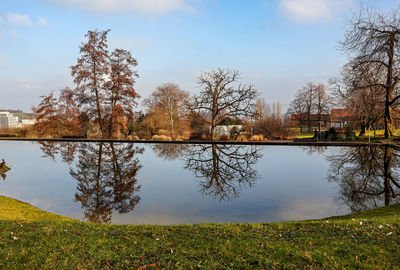 Scenic view of lake against sky during autumn