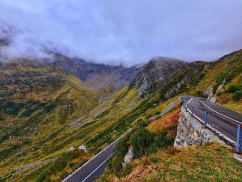 Panoramic view of road amidst mountains against sky