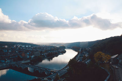 High angle view of river against sky in city