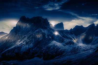 Scenic view of snowcapped mountains against sky